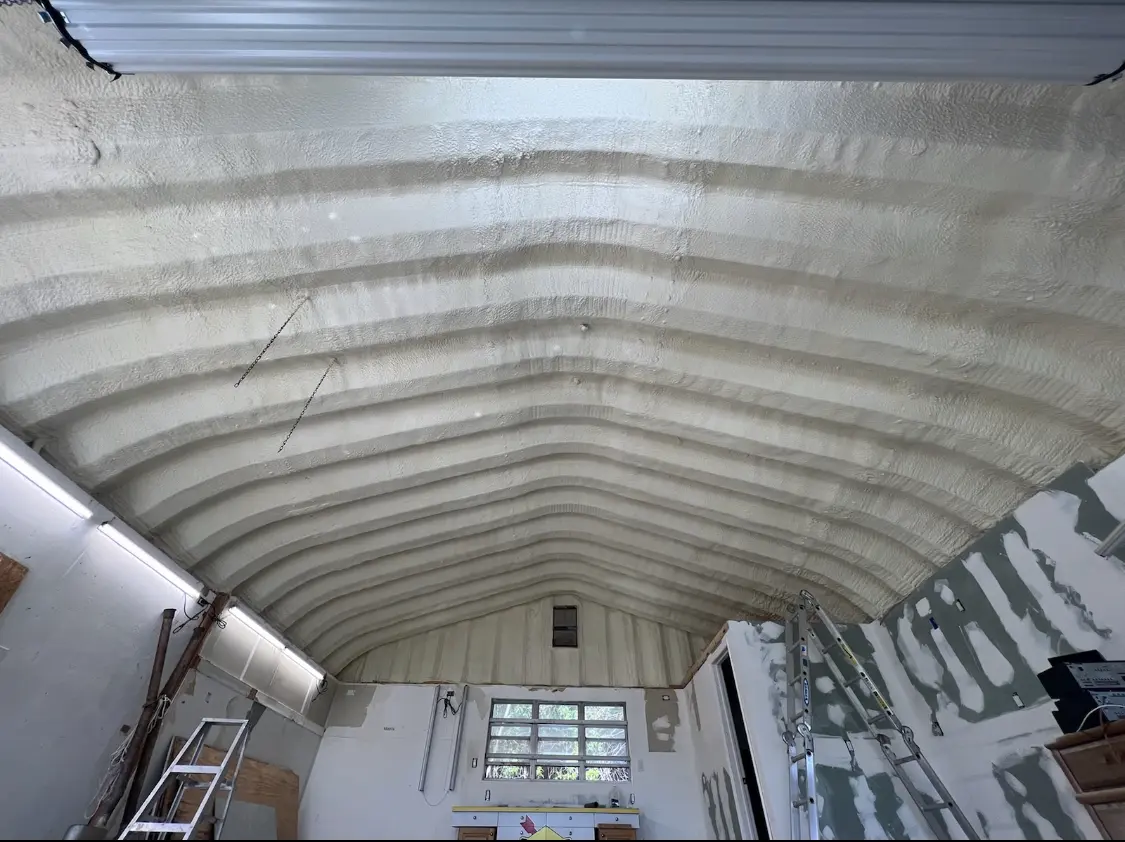 Spray polyurethane foam applied to the underside of a metal roof deck in Maumelle